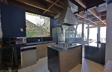 Imagem 16: Casa costeira contemporânea em condomínio exclusivo com heliponto