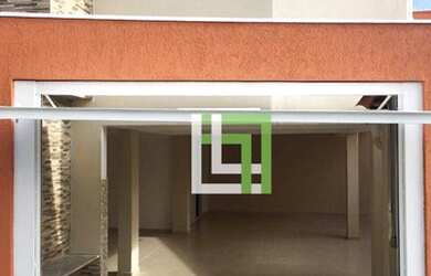 Imagem: A casa possui 3 Dormitórios, 3 Banheiros, 4 Vagas na garagem