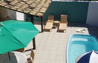 Imagem: A casa possui 4 Dormitórios, 2 Vagas na garagem e está localizado