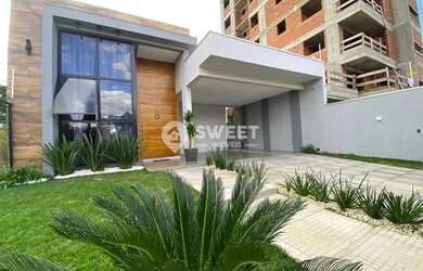 Imagem: A casa possui 3 Dormitórios, 3 Banheiros, 2 Vagas na garagem