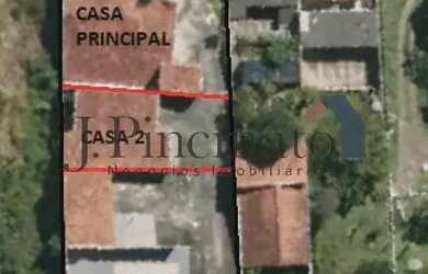 Imagem: A casa possui 4 Dormitórios, 5 Banheiros, 5 Vagas na garagem