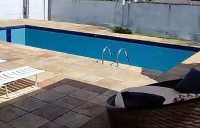 Imagem: A casa possui 4 Dormitórios, 5 Banheiros, 4 Vagas na garagem