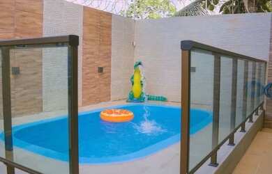 Imagem: A casa possui 5 Dormitórios e 3 Vagas na garagem e está localizado