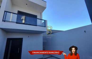 Imagem: A casa possui 3 Dormitórios, 3 Banheiros, 2 Vagas na garagem