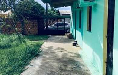 Imagem: A casa possui 3 Dormitórios, 3 Banheiros, 2 Vagas na garagem