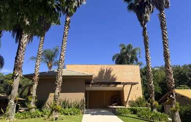 Imagem: A casa em condomínio possui 5 Dormitórios, 5 Banheiros, 4