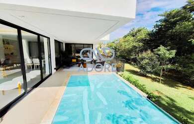 Imagem: A casa em condomínio possui 5 Dormitórios, 5 Banheiros, 3