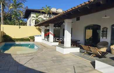 Imagem: A casa possui 4 Dormitórios, 3 Banheiros, 2 Vagas na garagem