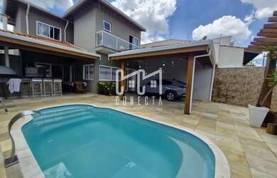 Imagem: A casa possui 3 Dormitórios, 3 Banheiros, 3 Vagas na garagem