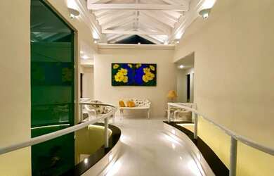 Imagem 13: Casa frente ao mar à venda na praia da Enseada em Guarujá