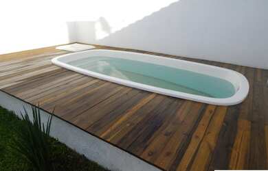 Imagem: A casa possui 3 Dormitórios, 2 Banheiros, 2 Vagas na garagem