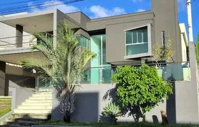 Imagem: A casa possui 3 Dormitórios, 3 Banheiros, 4 Vagas na garagem