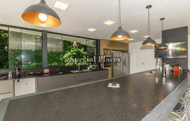 Imagem 16: Belíssima! Projeto contemporâneo em meio a natureza!