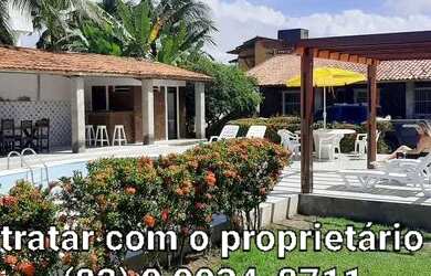 Imagem: A casa possui 4 Dormitórios e 5 Vagas na garagem e está localizado