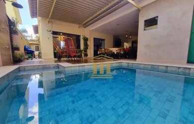 Imagem: A casa em condomínio possui 4 Dormitórios, 5 Banheiros, 4