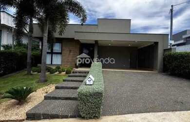 Imagem: A casa possui 3 Dormitórios, 5 Banheiros, 4 Vagas na garagem