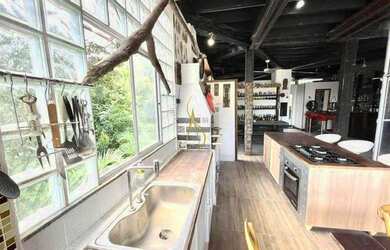 Imagem 11: Charmosa casa assinada por Zanina Caldas com encantadora vista panorâmica!