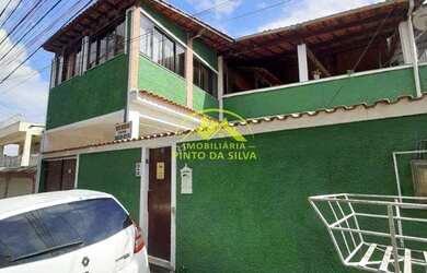 Imagem: A casa possui 4 Dormitórios, 2 Banheiros, 3 Vagas na garagem