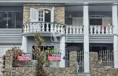 Imagem: A casa possui 5 Dormitórios, 3 Banheiros, 3 Vagas na garagem