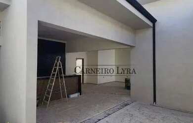 Imagem: A casa possui 3 Dormitórios, 3 Banheiros, 4 Vagas na garagem