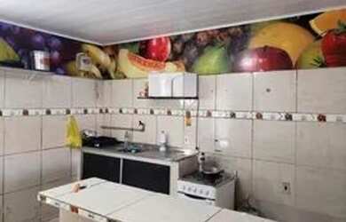 Imagem: A casa possui 3 Dormitórios, 2 Banheiros, 1 Vaga na garagem