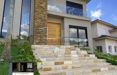 Imagem: A casa em condomínio possui 4 Dormitórios, 5 Banheiros, 3