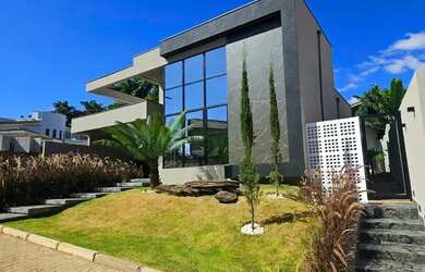 Imagem: A casa em condomínio possui 3 Dormitórios, 4 Banheiros, 2