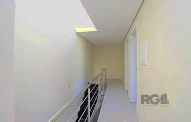 Imagem 16: Casa em Porto Alegre, no bairro Hípica, com 3 dormitório s , e 3 banheiros,...