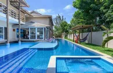 Imagem: A casa possui 5 Dormitórios, 5 Banheiros, 1 Vaga na garagem