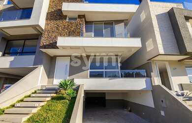 Imagem: A casa em condomínio possui 3 Dormitórios, 3 Banheiros, 3