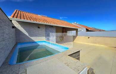 Imagem: A casa possui 3 Dormitórios, 4 Banheiros, 2 Vagas na garagem