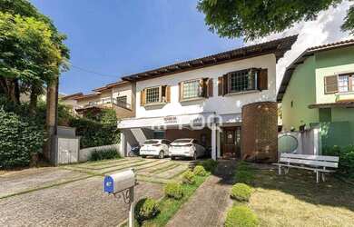 Imagem: A casa em condomínio possui 4 Dormitórios, 5 Banheiros, 4