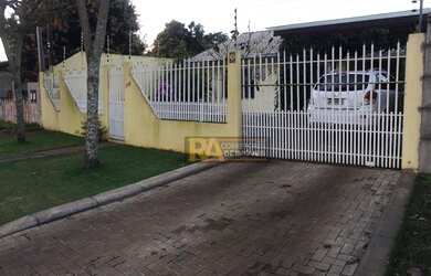 Imagem: A casa possui 3 Dormitórios, 3 Banheiros, 3 Vagas na garagem