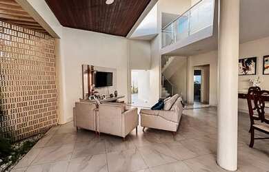 Imagem: A casa possui 5 Dormitórios, 5 Banheiros, 5 Vagas na garagem