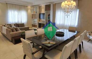 Imagem: A casa possui 5 Dormitórios, 4 Banheiros, 5 Vagas na garagem