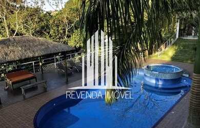 Imagem: A casa em condomínio possui 5 Dormitórios, 5 Banheiros, 5