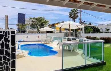 Imagem: A casa em condomínio possui 5 Dormitórios, 5 Banheiros, 5