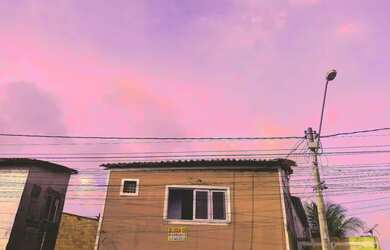 Imagem: A casa possui 2 Dormitórios, 1 Banheiro, 1 Vaga na garagem