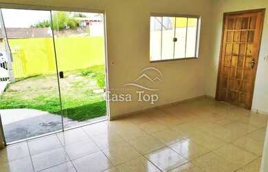 Imagem: A casa possui 2 Dormitórios, 1 Banheiro, 1 Vaga na garagem