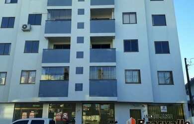 Imagem: O apartamento possui 3 Dormitórios, 1 Banheiro, 1 Vaga na garagem