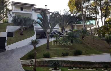 Imagem: A casa em condomínio possui 5 Dormitórios, 5 Banheiros, 5