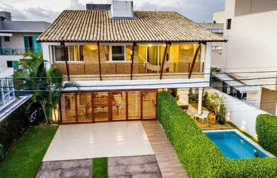 Imagem: A casa possui 4 Dormitórios, 4 Banheiros, 4 Vagas na garagem