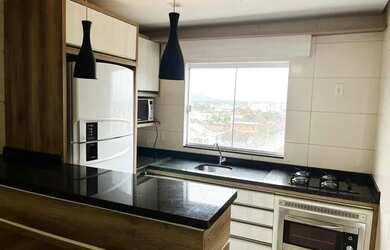 Imagem: O apartamento possui 2 Dormitórios, 1 Banheiro, 2 Vagas na