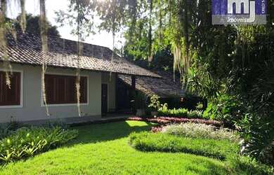 Imagem: A casa em condomínio possui 4 Dormitórios, 4 Banheiros, 5