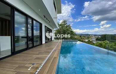 Imagem: A casa em condomínio possui 5 Dormitórios, 5 Banheiros, 4