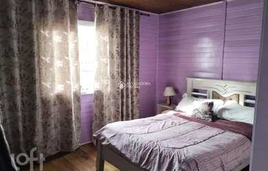 Imagem: A casa possui 2 Dormitórios, 1 Banheiro, 1 Vaga na garagem