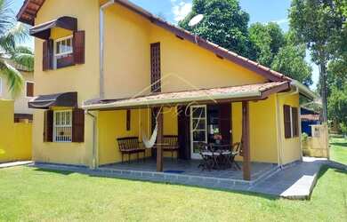 Imagem: A casa possui 3 Dormitórios, 2 Banheiros, 3 Vagas na garagem