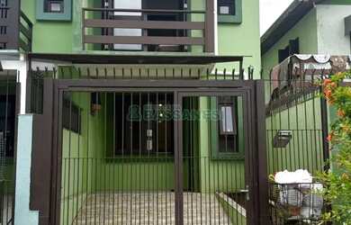 Imagem: A casa possui 2 Dormitórios, 1 Banheiro, 1 Vaga na garagem