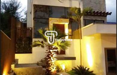 Imagem: A casa possui 3 Dormitórios, 4 Banheiros, 3 Vagas na garagem