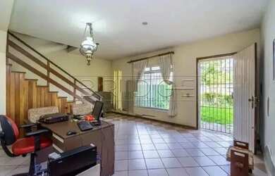 Imagem: A casa possui 3 Dormitórios, 4 Banheiros, 4 Vagas na garagem